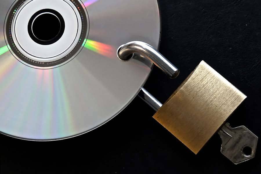 Locked disc being unlocked by a key