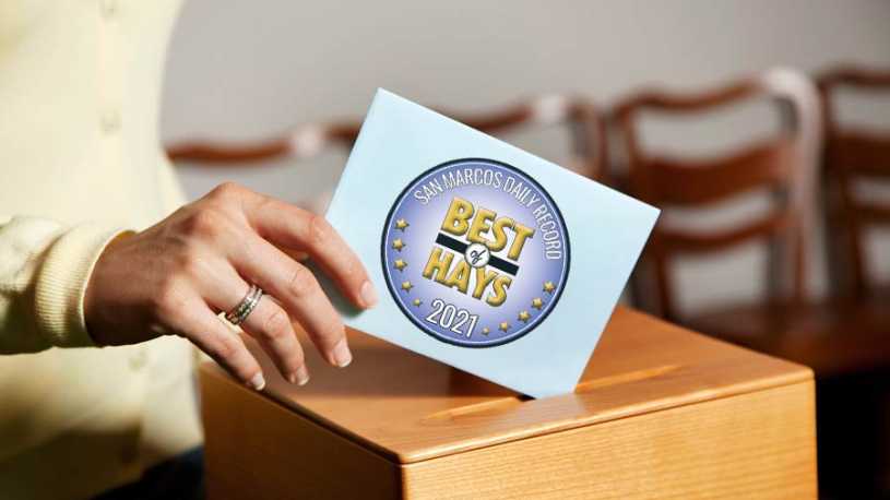 Hand submitting a voting ballot with the San Marcos Daily Record Best of Hays 2021 logo