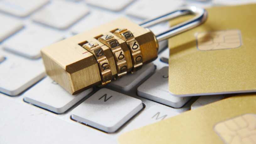 Pad lock and credit cards on top of a keyboard