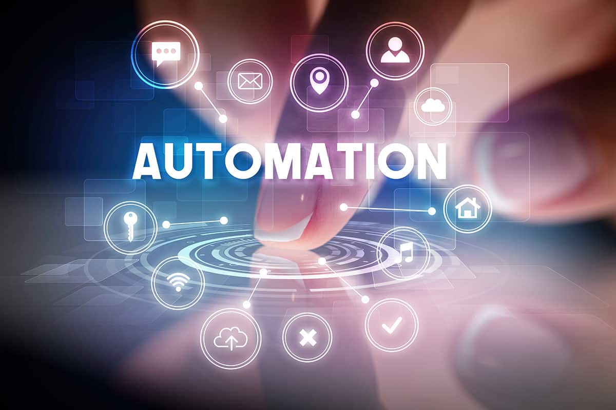 Finger touching automation interface with connected smart technology icons